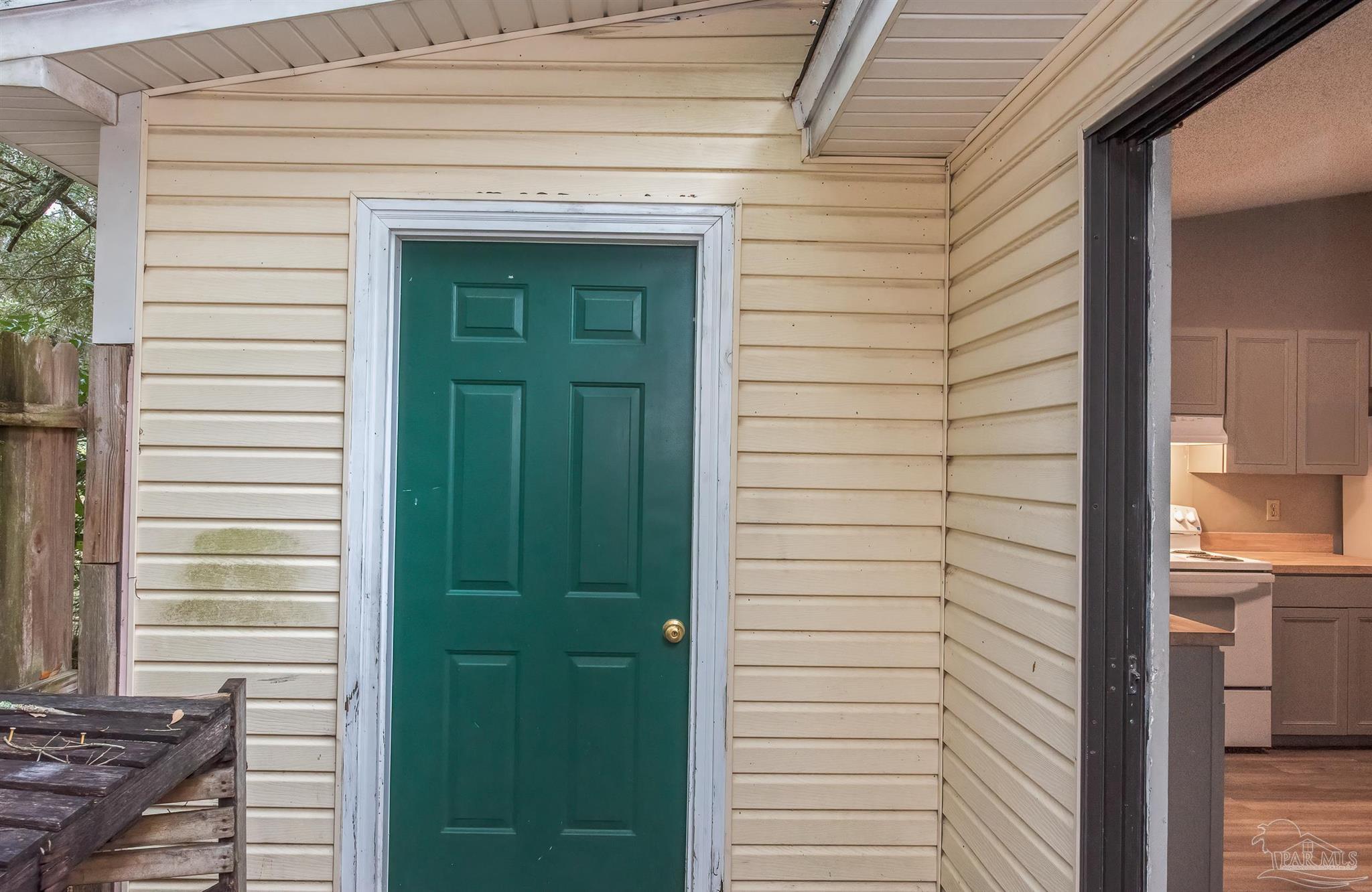 8210 Kipling Street, Unit A Pensacola, FL 32514 - Photo 13 of 13 a view of front door