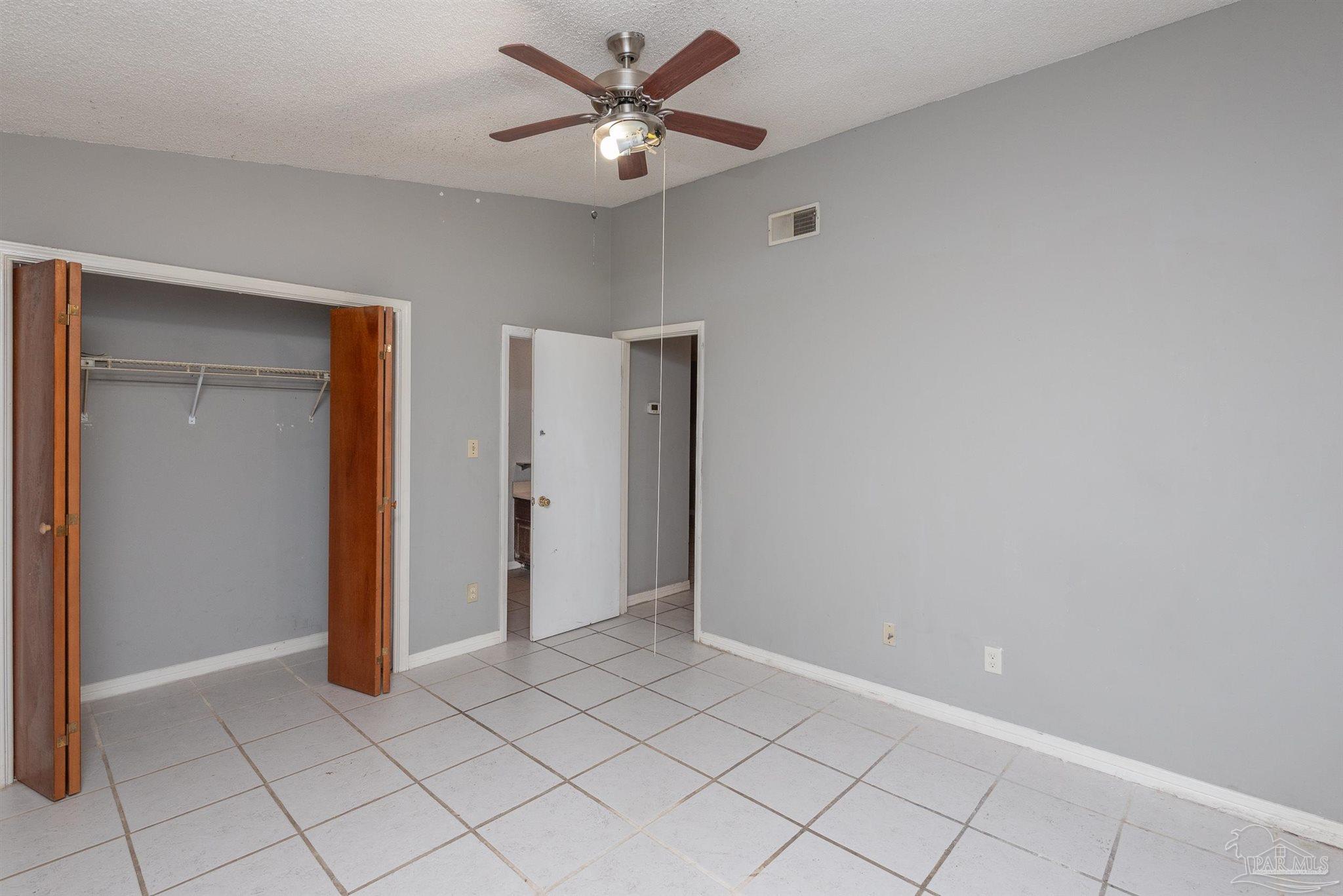 8210 Kipling Street, Unit A Pensacola, FL 32514 - Photo 6 of 13 a view of an empty room