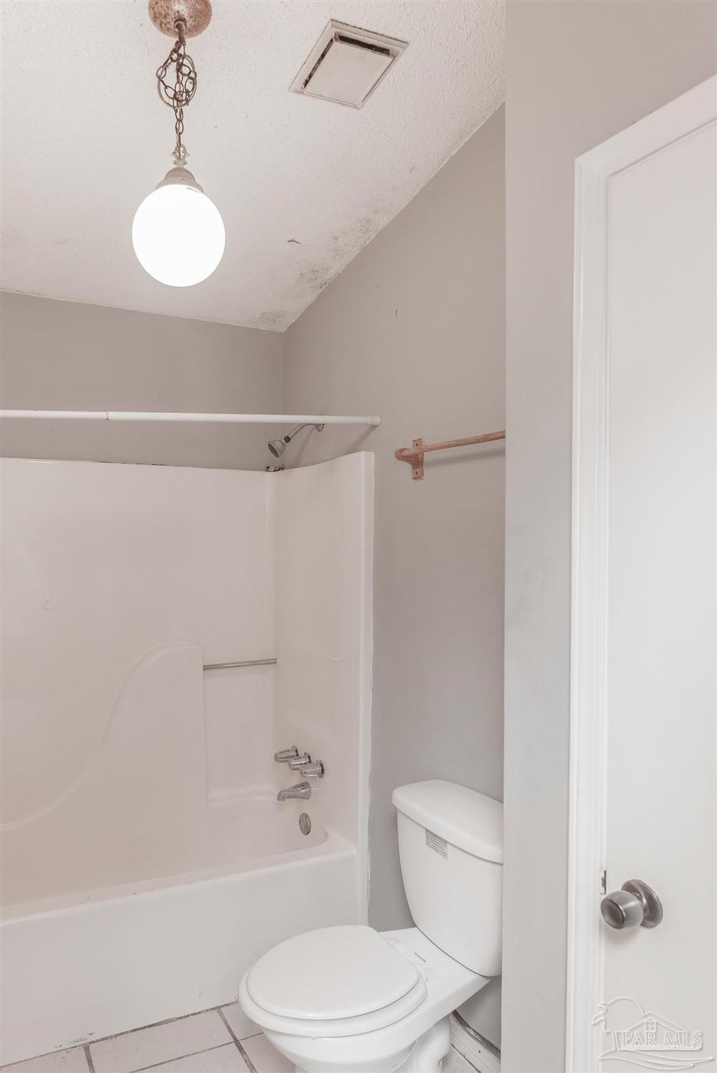 8210 Kipling Street, Unit A Pensacola, FL 32514 - Photo 8 of 13 a bathroom with a toilet a sink and shower