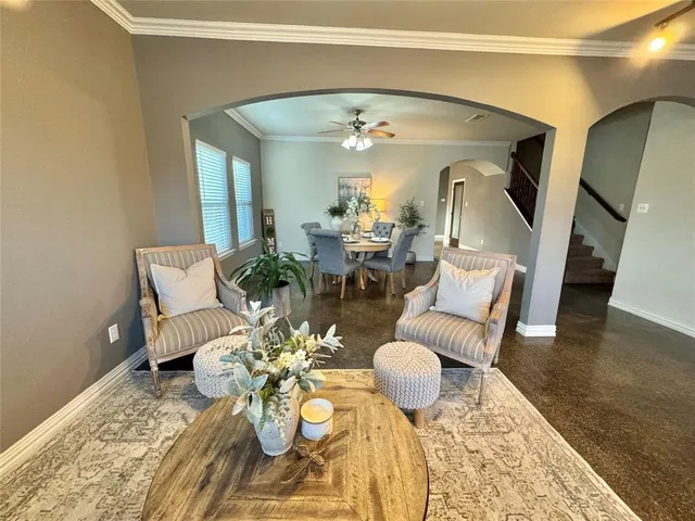 a view of a dining room with furniture