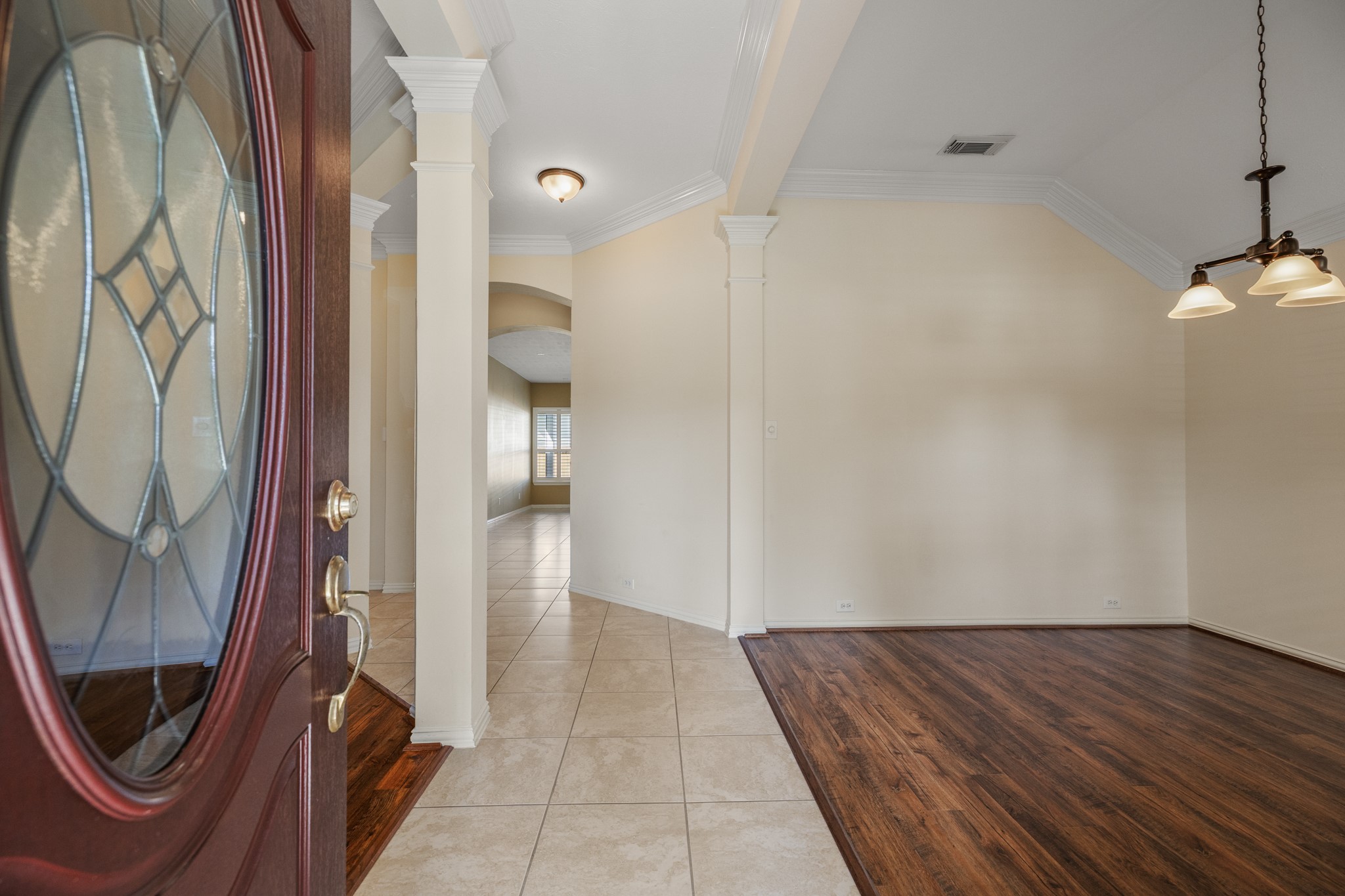 20014 Queens Oak Court Spring, TX 77379 - Photo 3 of 49 a view of a hallway with wooden floor and staircase