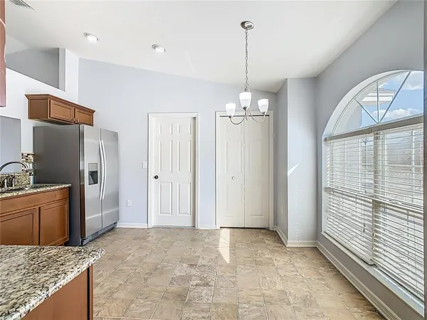 a view of a kitchen with a sink and dishwasher kitchen view