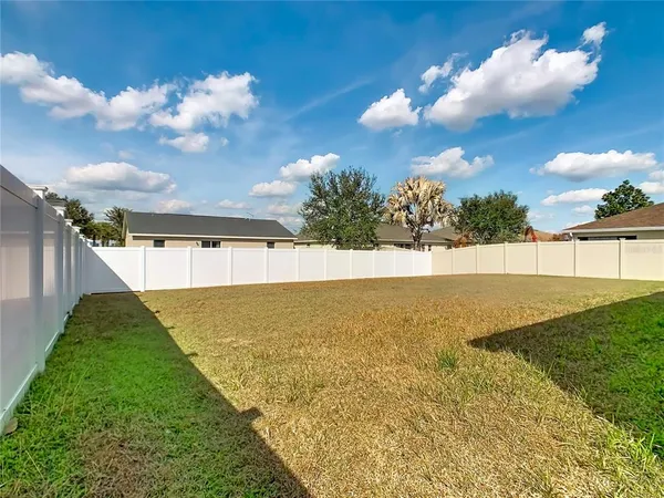 a view of a swimming pool with an outdoor space