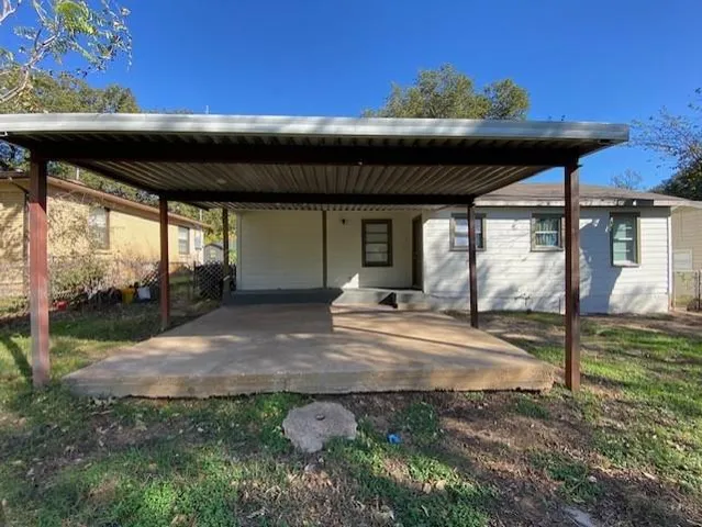 a view of backyard with green space