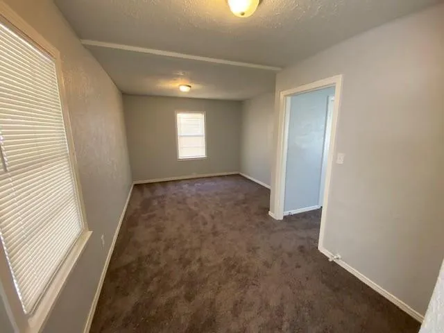 a utility room with cabinets washer and dryer