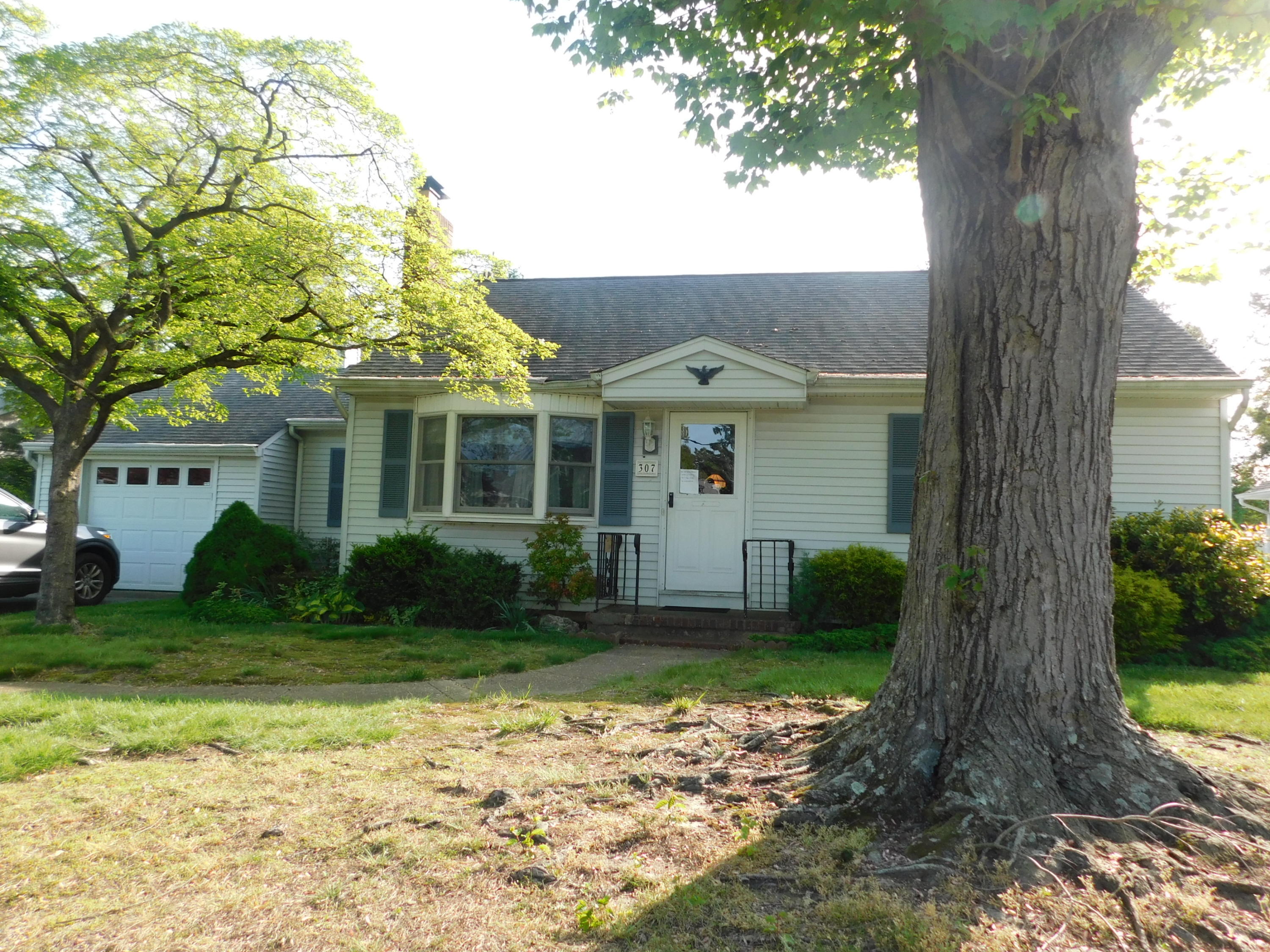 307 Eastham Road Point Pleasant, NJ 08742 - Photo 1 of 11 a view of a house with a yard