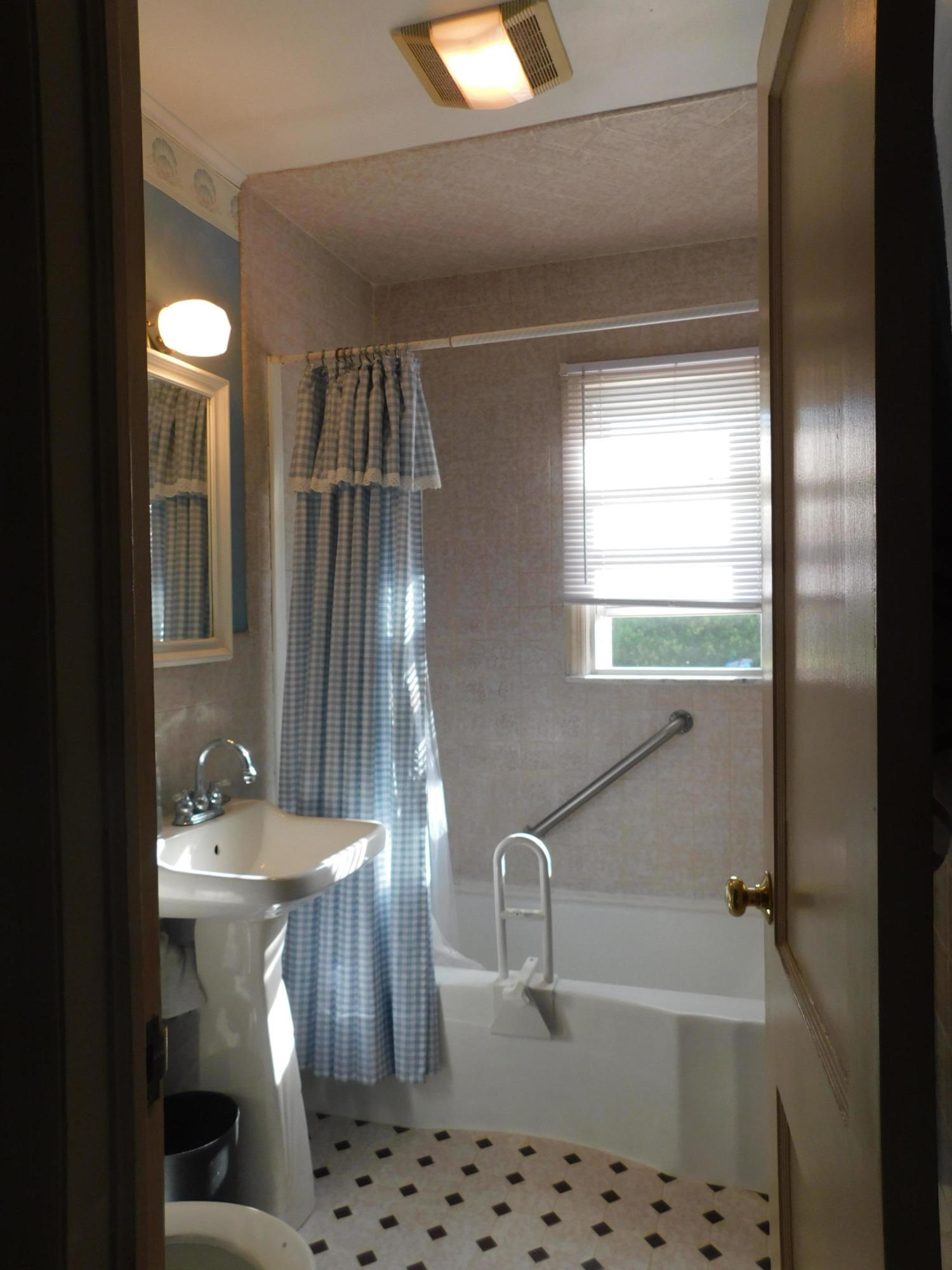 307 Eastham Road Point Pleasant, NJ 08742 - Photo 6 of 11 a bathroom with a sink a toilet and shower