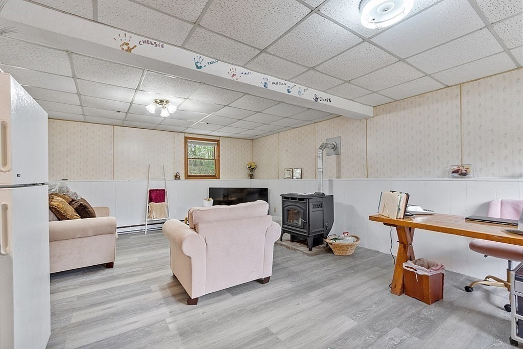 68 Gardner Road Winchendon, MA 01475 - Photo 28 of 41 a living room with furniture and a wooden floor