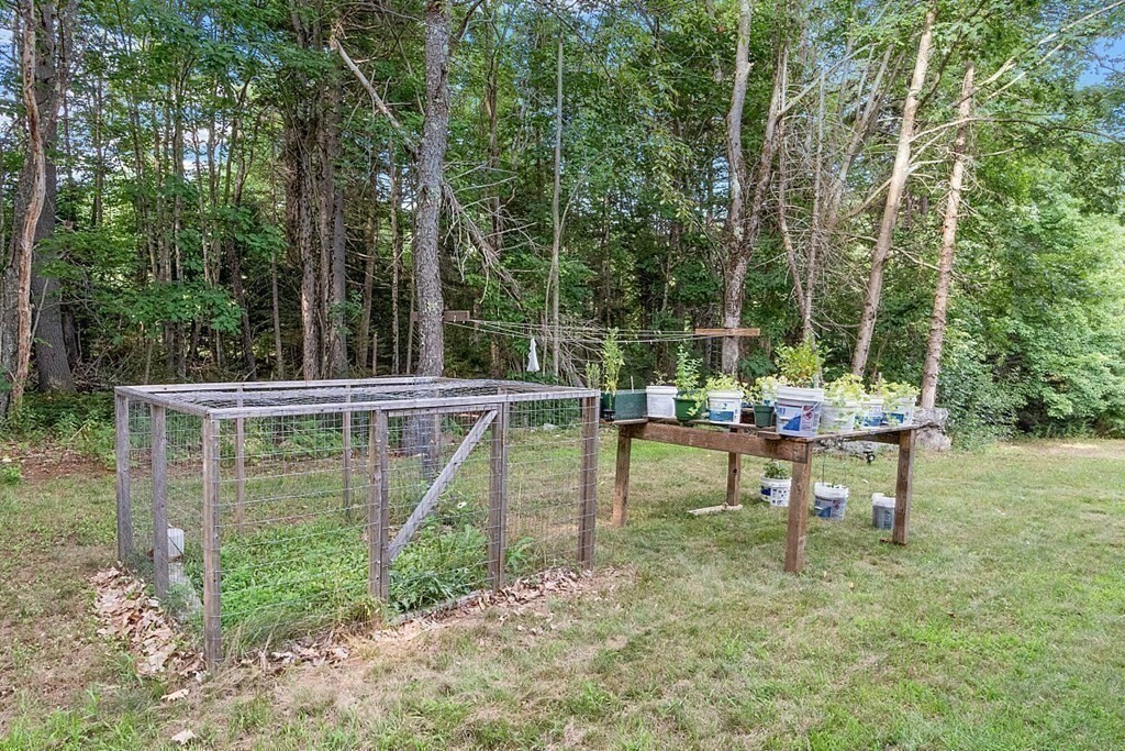 68 Gardner Road Winchendon, MA 01475 - Photo 35 of 41 a view of a bench in a garden