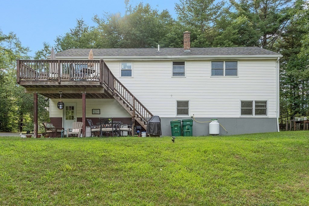 68 Gardner Road Winchendon, MA 01475 - Photo 38 of 41 a view of a house with a yard and sitting area