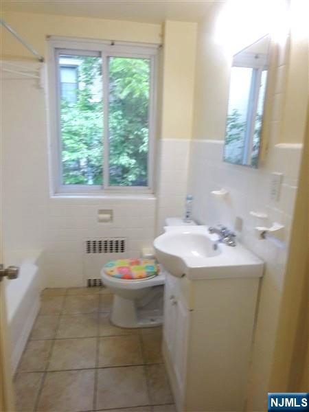 700 Kinderkamack Road River Edge, NJ 07661 - Photo 14 of 19 a bathroom with a sink toilet and window