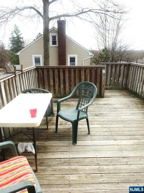 700 Kinderkamack Road River Edge, NJ 07661 - Photo 19 of 19 a view of a roof deck with wooden floor and fence