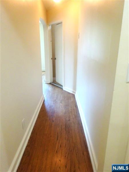 700 Kinderkamack Road River Edge, NJ 07661 - Photo 6 of 19 a view of a hallway with wooden floor