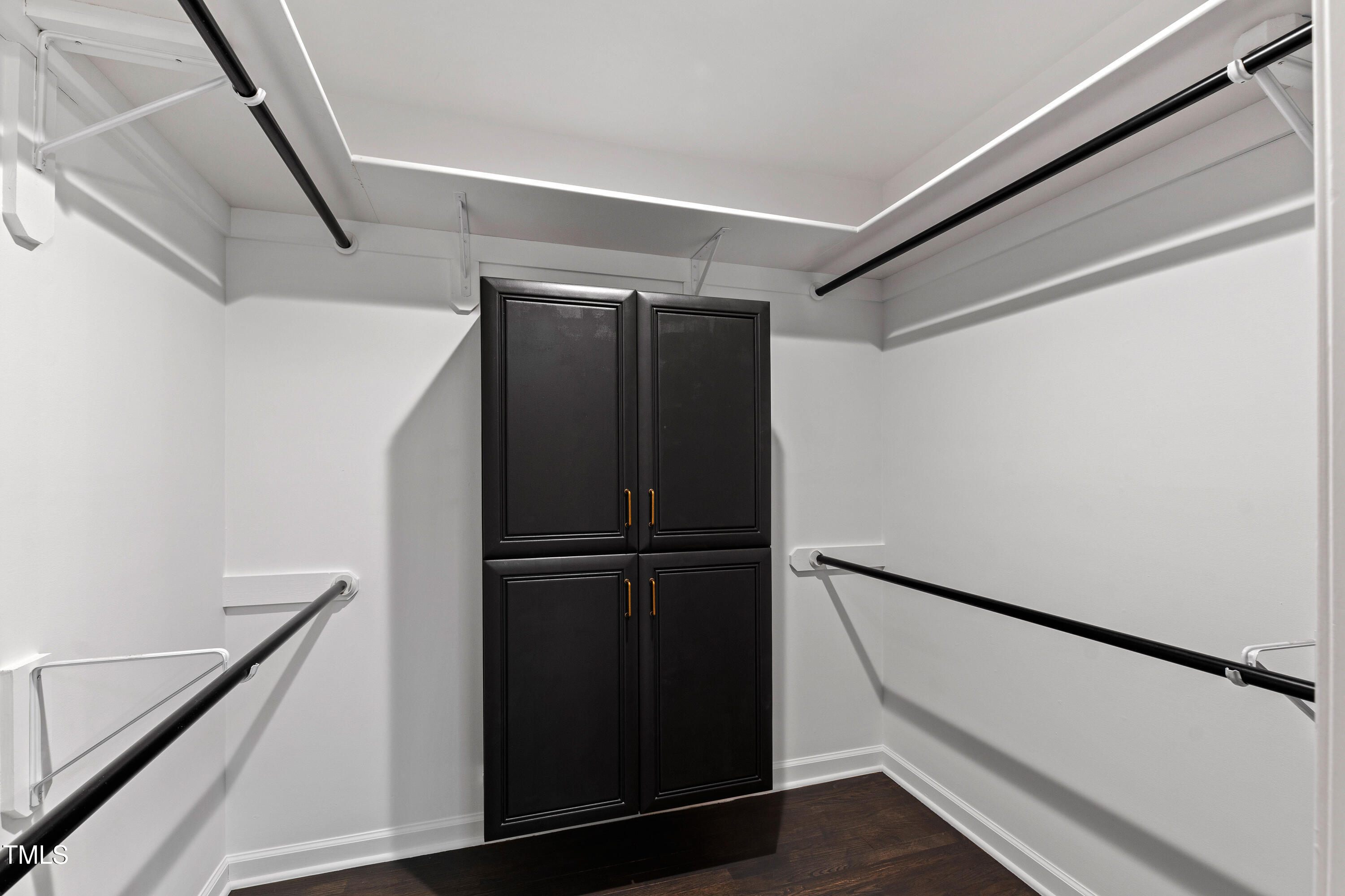 10805 The Olde Place Raleigh, NC 27614 - Photo 42 of 91 a view of walk in closet with wooden floor