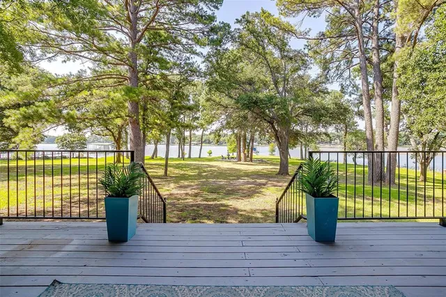 a view of deck with furniture and wooden floor