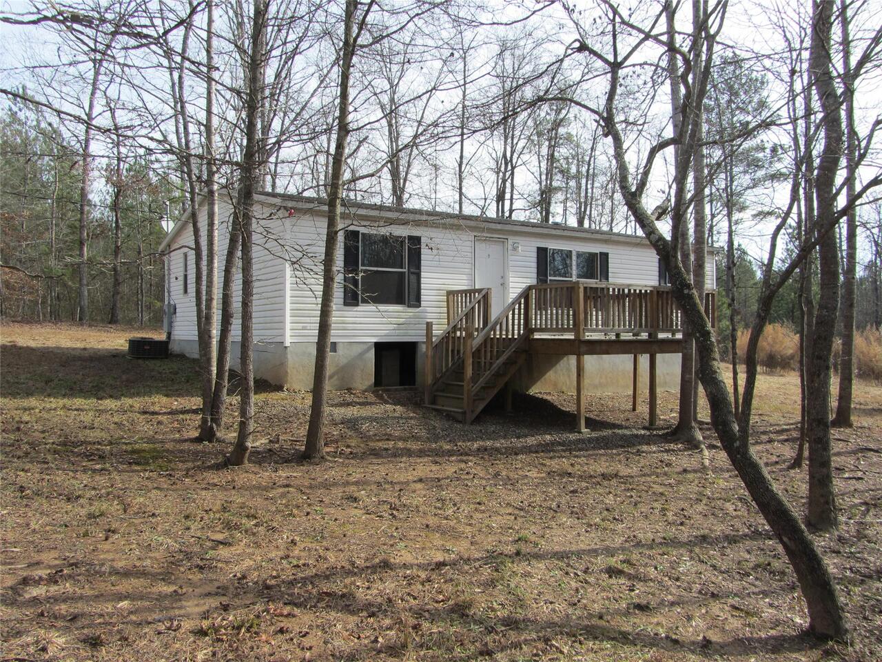2275 Shoal Creek Road Colbert, GA 30628 - Photo 1 of 1 a view of a house with a yard