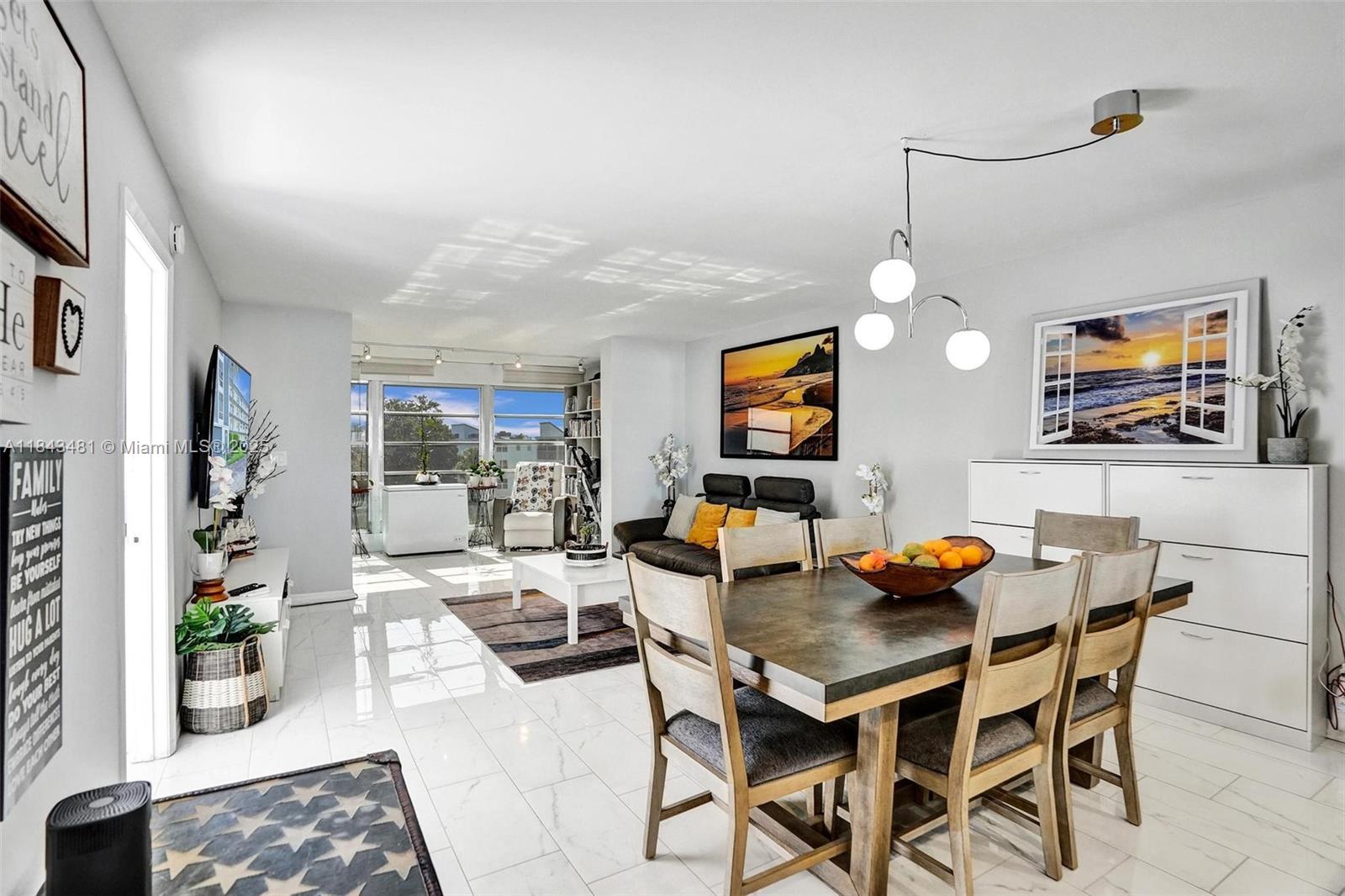7664 Northwest 18th Street, Unit 405 Margate, FL 33063 - Photo 24 of 46 a view of a dining room with furniture