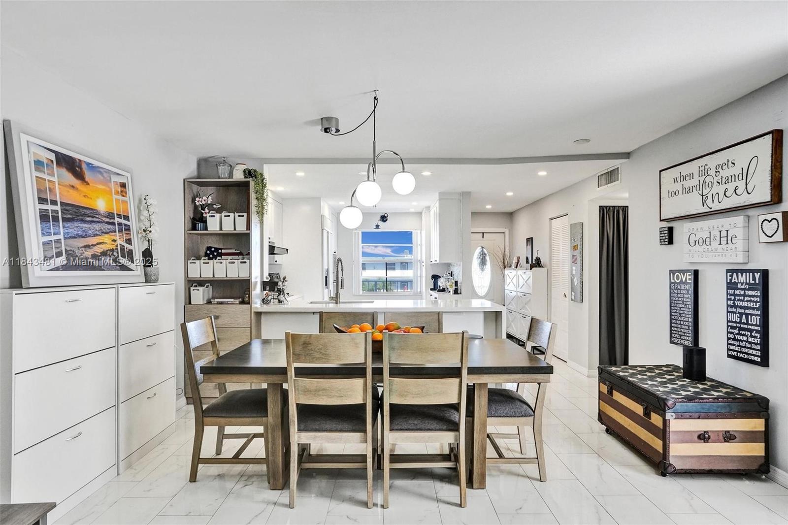 7664 Northwest 18th Street, Unit 405 Margate, FL 33063 - Photo 31 of 46 a dining room with furniture and window