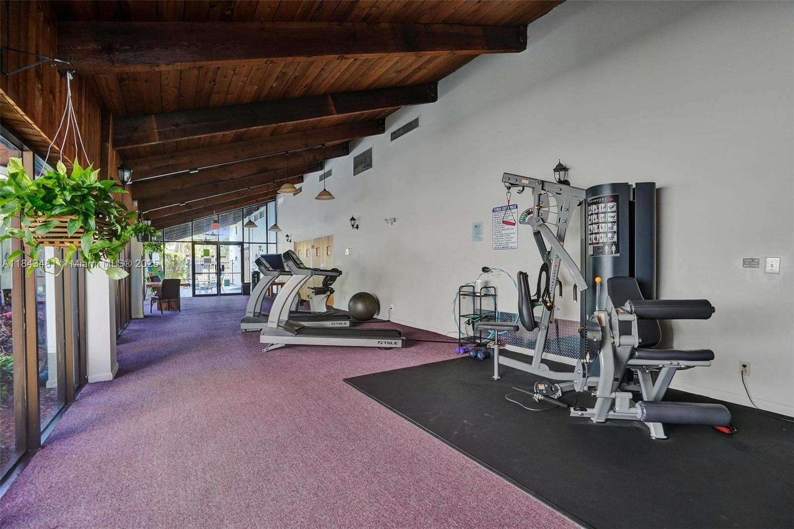 7664 Northwest 18th Street, Unit 405 Margate, FL 33063 - Photo 36 of 46 a view of a room with gym equipment