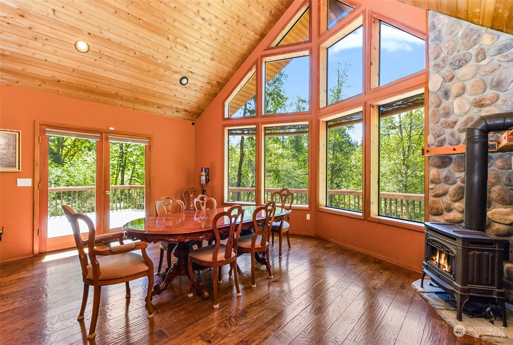 6930 Robe Menzel Road Granite Falls, WA 98252 - Photo 13 of 25 a view of a dining room with furniture window and wooden floor