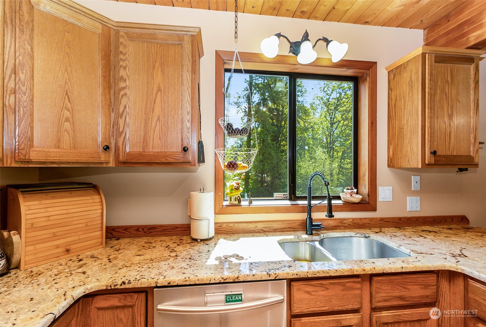 6930 Robe Menzel Road Granite Falls, WA 98252 - Photo 8 of 25 a kitchen with granite countertop sink and granite counter tops