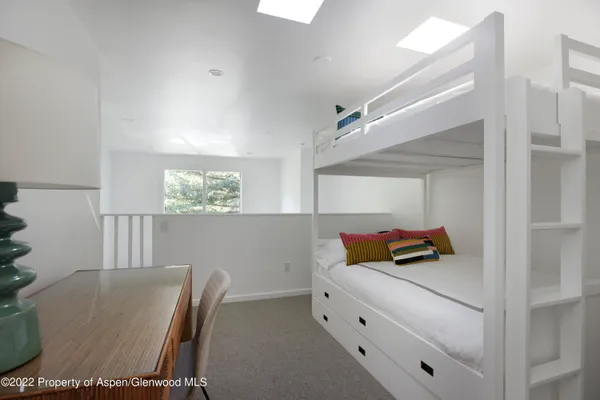 a room with furniture and window