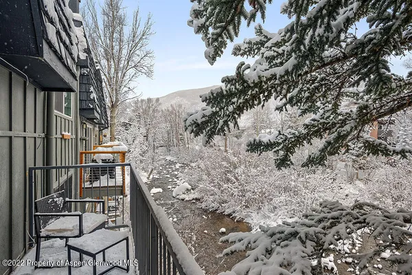 a view of a balcony with an outdoor space