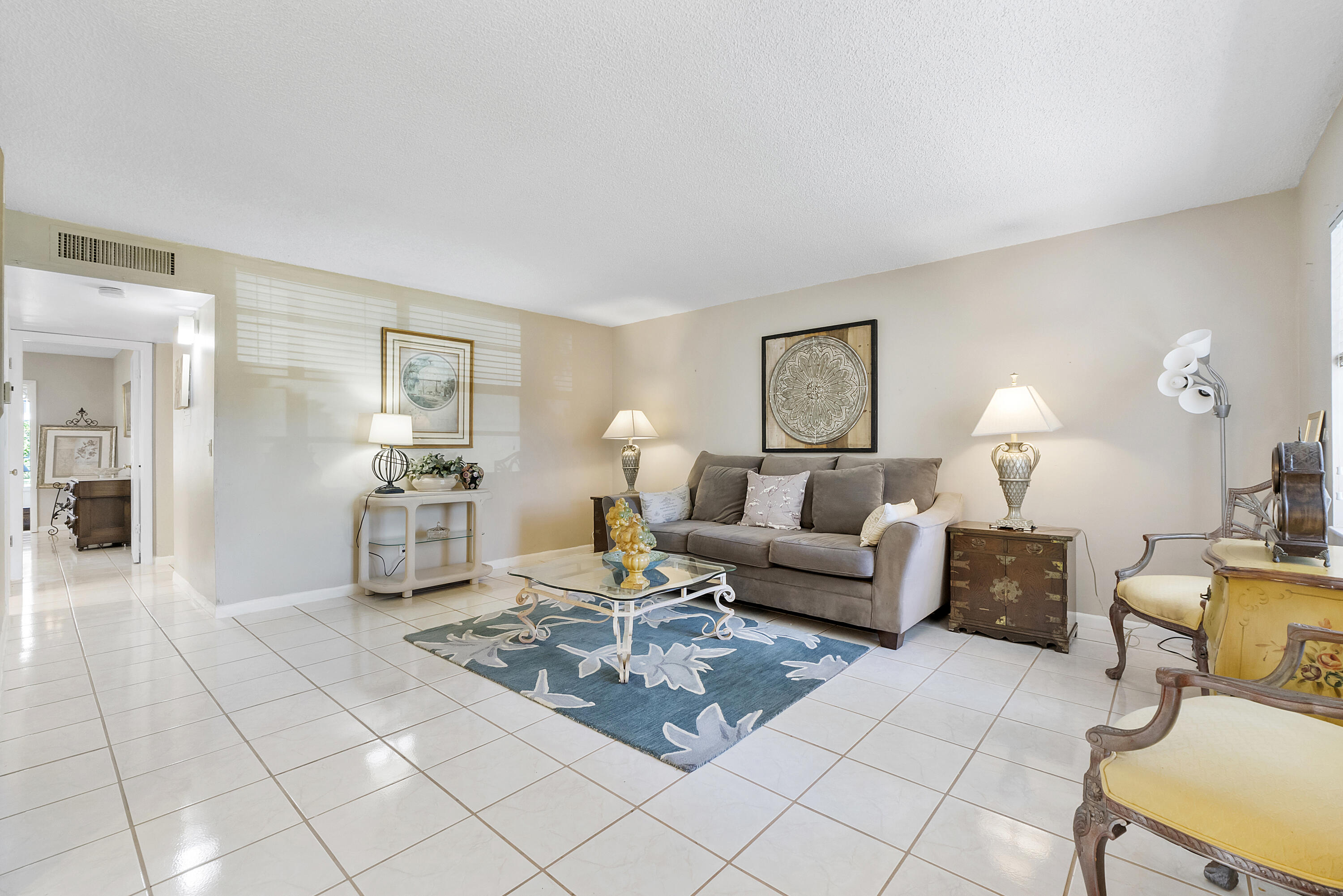 157 Flanders C Delray Beach, FL 33484 - Photo 2 of 45 a living room with furniture