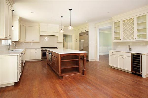100 Wayne Road Newton, MA 02459 - Photo 6 of 14 a kitchen with a stove a sink and a refrigerator