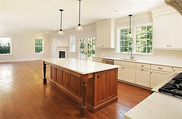 100 Wayne Road Newton, MA 02459 - Photo 7 of 14 a kitchen with stainless steel appliances granite countertop a sink a stove and a wooden floors