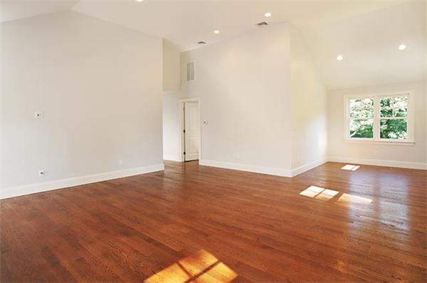 100 Wayne Road Newton, MA 02459 - Photo 10 of 14 an empty room with wooden floor and windows
