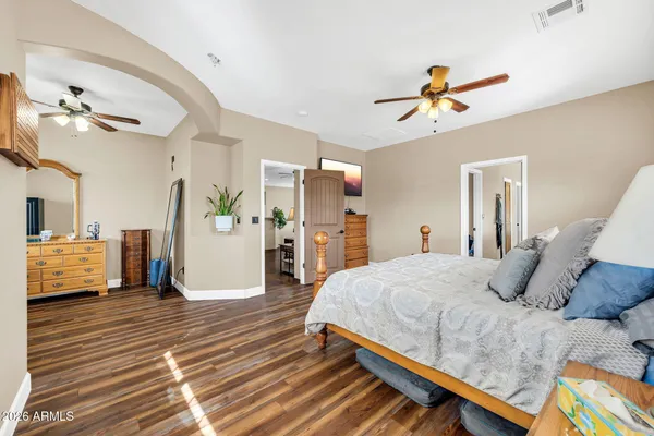 a bedroom with bed and window