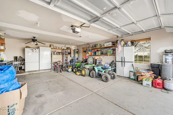 a bathroom with a granite countertop sink a mirror and a