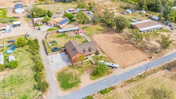 an aerial view of residential house with outdoor space
