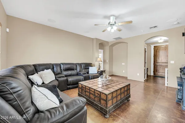 a picture of a bench in front of a gate