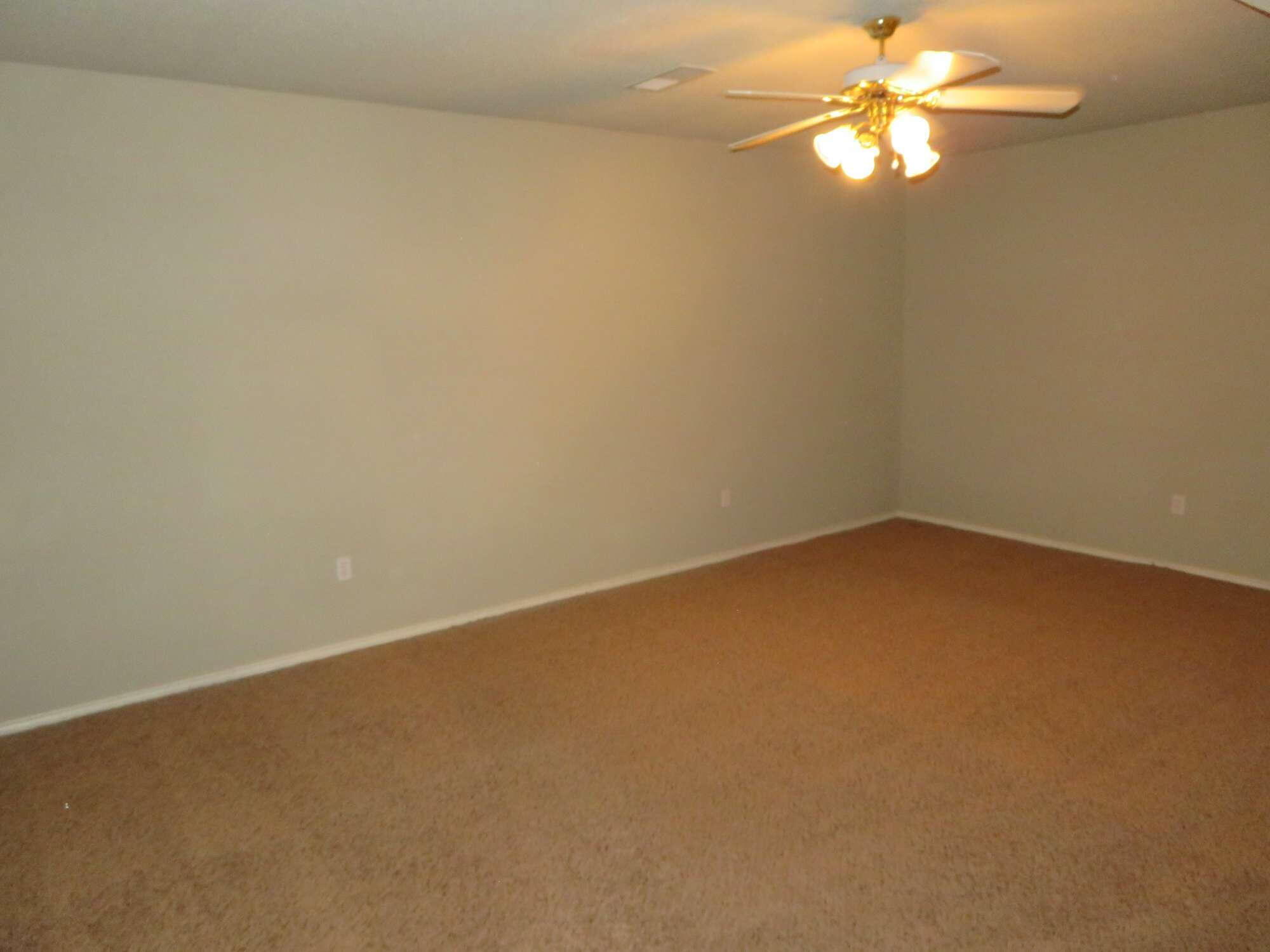 3403 97th Street Lubbock, TX 79423 - Photo 10 of 10 wooden floor in an empty room