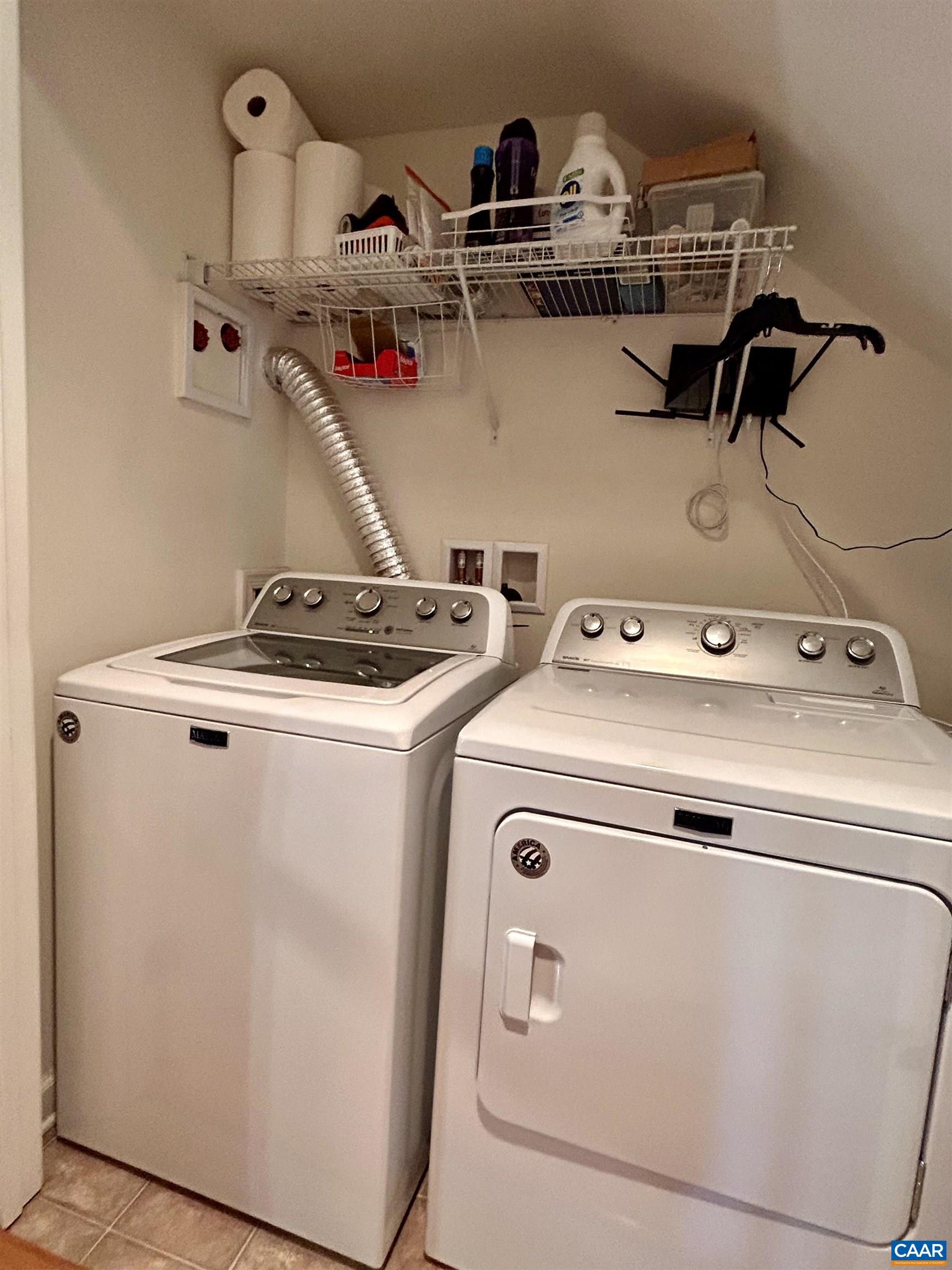 76 Villa Circle Palmyra, VA 22963 - Photo 17 of 18 a utility room with dryer and washer