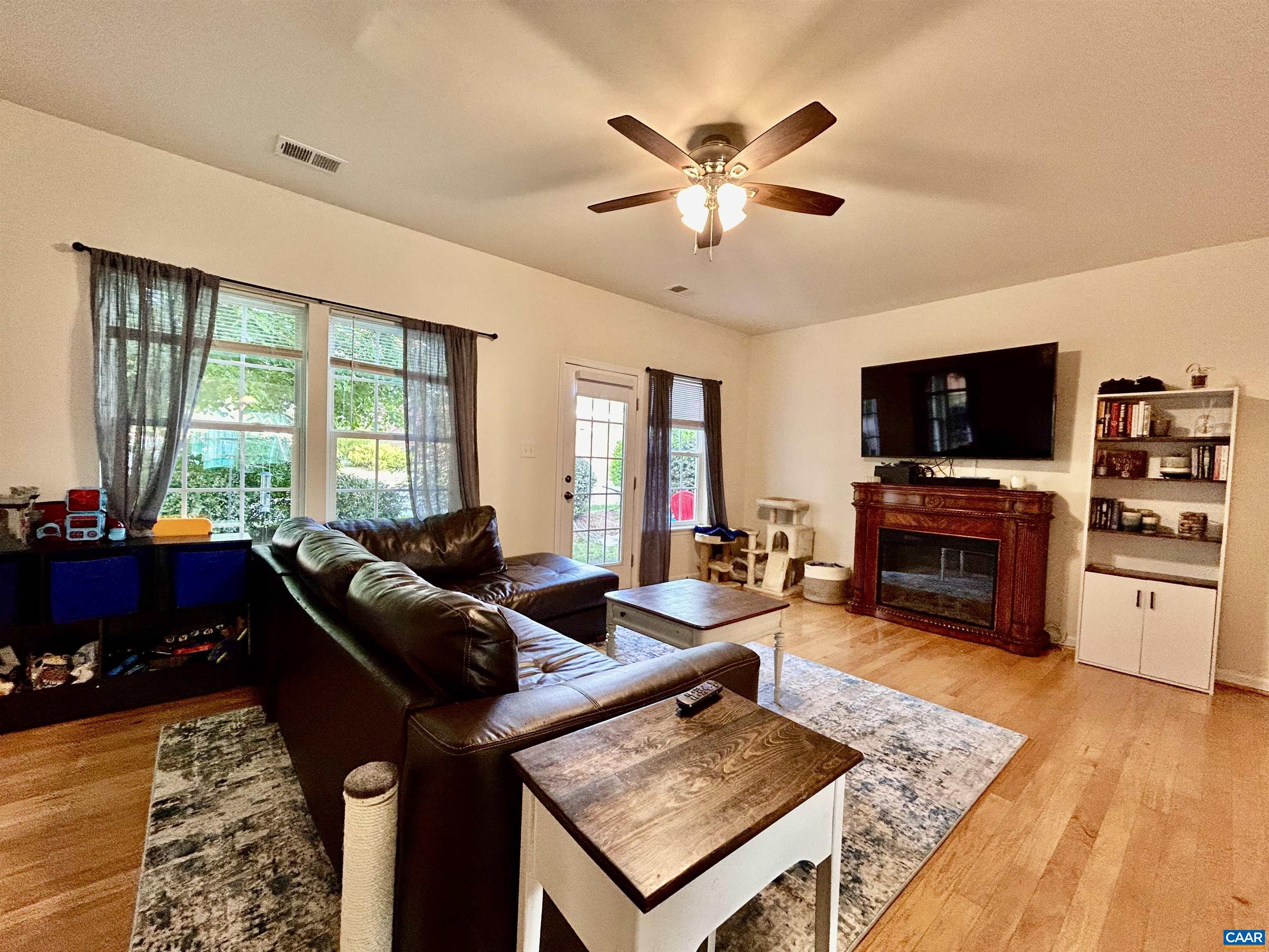76 Villa Circle Palmyra, VA 22963 - Photo 4 of 18 a living room with furniture and a flat screen tv