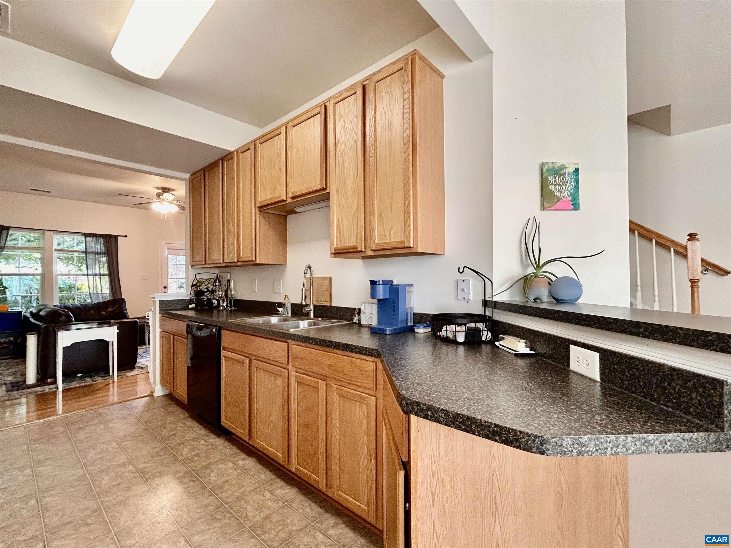 76 Villa Circle Palmyra, VA 22963 - Photo 8 of 18 a kitchen with a sink a stove and a cabinets