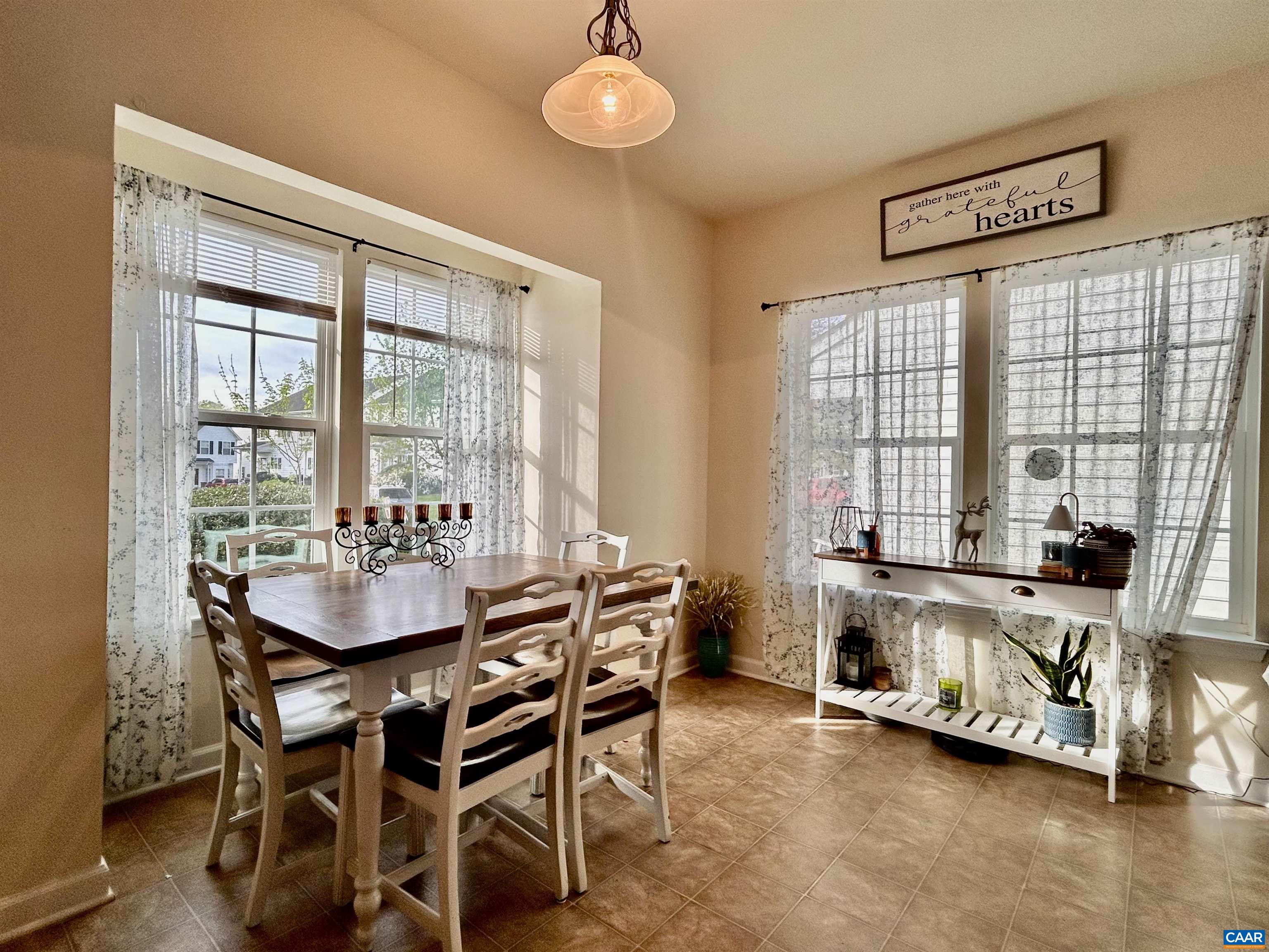 76 Villa Circle Palmyra, VA 22963 - Photo 10 of 18 a view of a dining room with furniture window and outside view