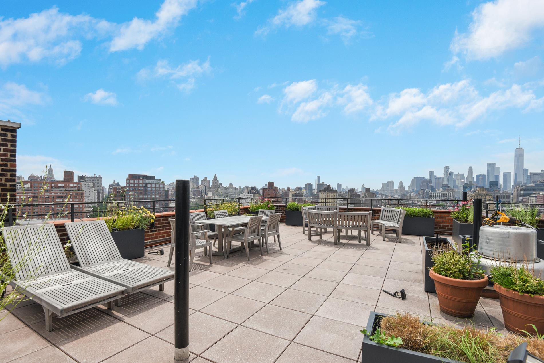 31 Jane Street, Unit 2H Manhattan, NY 10014 - Photo 9 of 10 a view of a terrace with furniture and a potted plant