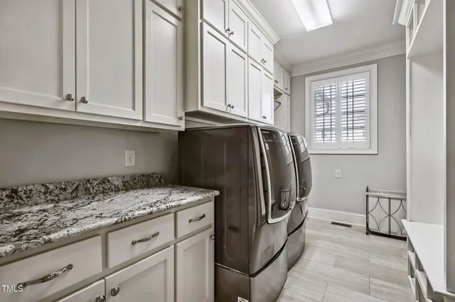 a kitchen with granite countertop a sink and a stove top oven