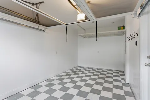 an aerial view of a city with lake view