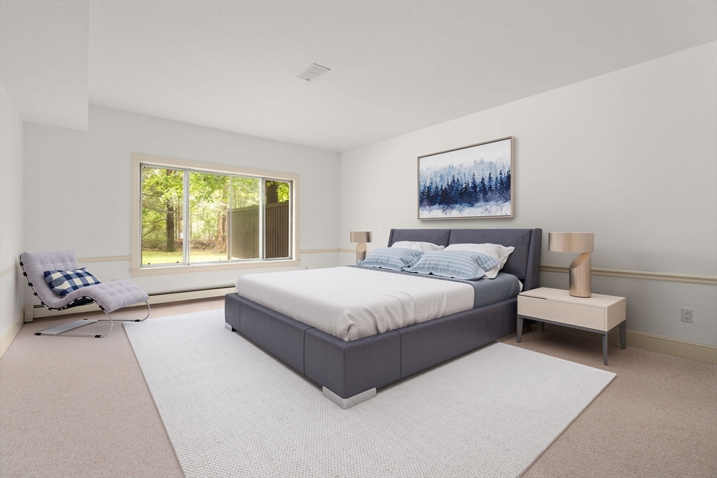 204 Allandale Road, Unit A Chestnut Hill, MA 02467 - Photo 14 of 19 a spacious bedroom with a bed and window