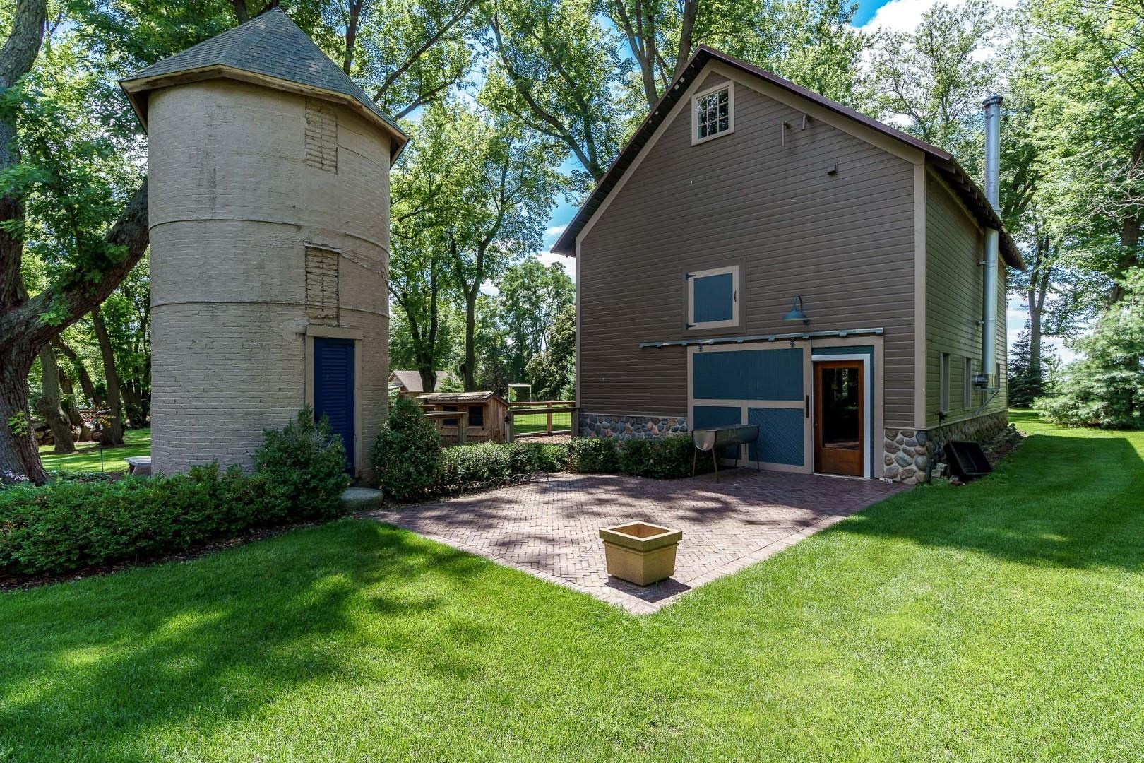 8607 Brown Road Caledonia, IL 61011 - Photo 50 of 94 front view of a house with a yard