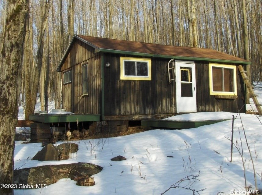 110 Stone Road Malone, NY 12953 - Photo 12 of 24 a front view of a house with a yard