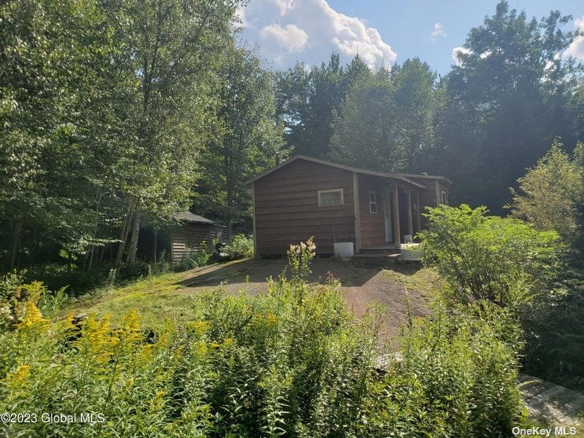 110 Stone Road Malone, NY 12953 - Photo 4 of 24 a backyard of a house with lots of green space