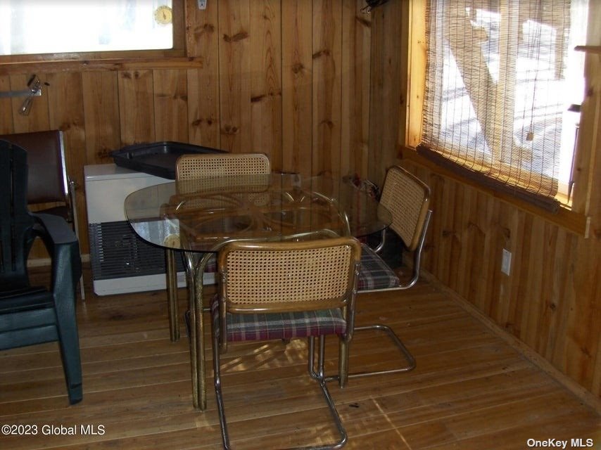 110 Stone Road Malone, NY 12953 - Photo 9 of 24 a view of a room with table and chairs