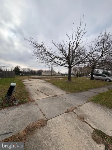 a view of a lake with a yard