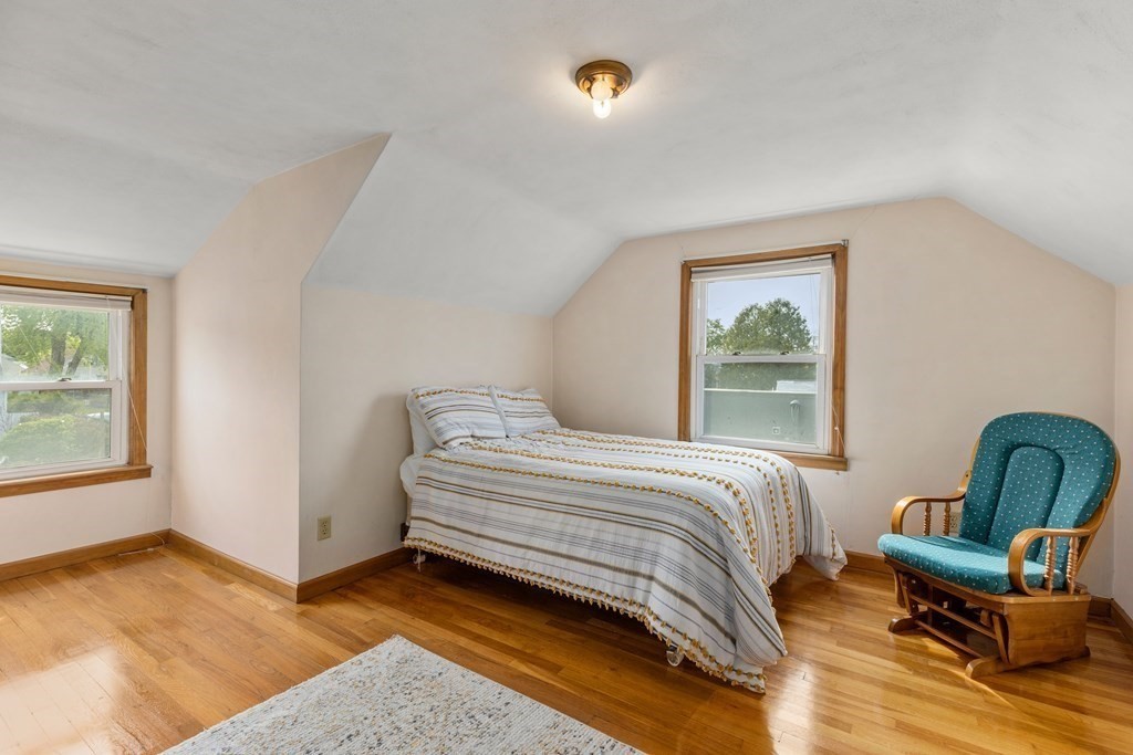 3 East Street Springfield, MA 01104 - Photo 20 of 29 a bedroom with furniture and a window